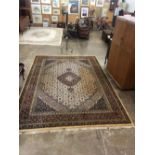 Large cream, red and blue ground silk carpet, 358cm x 261cm