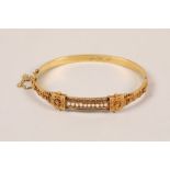 Ladies 15ct yellow gold and seed pearl Etruscan style bangle; gross weight 8.3g