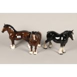 Beswick pottery model of a heavy horse and two others; 27cm high