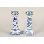 Pair of Chinese blue and white candlesticks; 28cm high