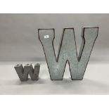 Metal letter W sign; 53cm high and another W; 17cm high