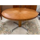 Mackintosh & Son teak table, on chrome suppoers