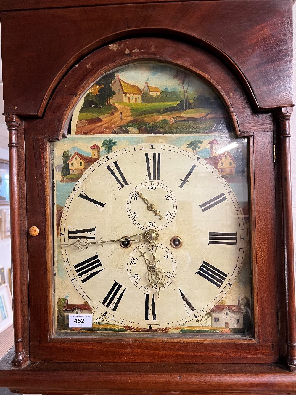 Early 19th century longcase clock with painted dial and twin winding holes