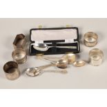 Assortment of silver napkins and spoons; approximately 250g gross weight