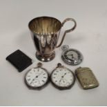 Nimra silver pocket watch, another, 1919, an Ingersoll watch, two vesta cases and an e.p. mug. (6).
