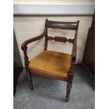 Early 19th century mahogany carver armchair with plain top rail and foliate mid rail above slip in