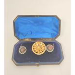 Victorian gold circular brooch of Japanese style with bowl and petals, and the matching earrings,
