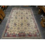 Chinese large wool on cotton carpet, the cream field with all over floral decoration in pink and