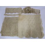 Antique lace veil of square form, approx. 108cm x 108cm and four pieces of lace trim.