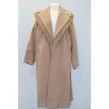 Brenner's vintage lady's camel wool swing coat, with astrakhan wool trim to collar.