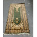 Indian rug with geometric and floral decoration, on cream, yellow, beige and green ground, 174cm x