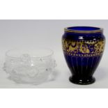 19th or early 20th century blue glass vase of baluster form with hand painted gilt panelling and