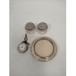 Geneva silver watch and two mounted glass jars and a circular photograph frame for 67mm.