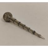 Silver telescopic pencil, six draw with embossed globular finial by Thornhill (Bond Street),