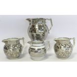 Pair of early 19th century silver lustre pearlware jugs with floral decoration, Greek key borders