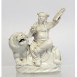 Chinese blanc de chine porcelain figure of the lion Spirit King (Shituowang) sitting on a lion