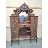 Ornate late Victorian mahogany side cabinet, c.1900, with canopy top above mirror, central drawer