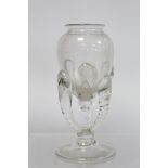 An unusual antique clear glass vase in the Anglo-Saxon claw beaker style, the ovoid bowl with