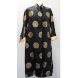 Vintage Chinese reversible black and gold silk coat, with brocade medallions.