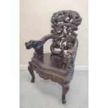 Late 19th/early 20th century Chinese carved hardwood 'Dragon' elbow chair, on carved cabriole