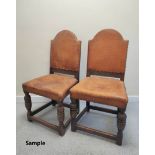 Set of six Jacobean revival oak dining chairs, upholstered in later studded hide, on baluster