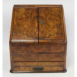 Victorian burr walnut writing box of sloping rectangular form with twin hinged doors, pull out