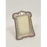 Silver mounted photograph frame of Arts & Crafts style on oak easel back, Chester 1902, for image