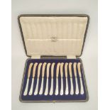 Set of twelve silver tea knives with pearl handles and scimitar blades, for Grant, Carlisle,