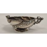 Hemespherical silver bowl of Dutch style, spirally fluted and embossed with figure handles by C S