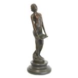 Cast bronze figure of maiden in diaphanous dress holding a letter, on black slate, socle plinth