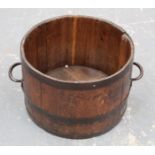 Antique oak planter or log bucket of coopered twin handled barrel form, approx. 62cm wide, 30cm