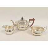 Silver three-piece tea set, boat shape with gadrooned edges, by Elkington & Co. Birmingham 1967,