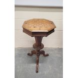 Victorian inlaid walnut sewing table, the octagonal marquetry inlaid games top, enclosing side lined