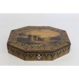 Early 19th century penwork box of octagonal form, the central panel depicting a ruined castle by a