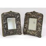 Near matching pair of Continental "Sterling" Silver rectangular dressing table mirrors, the frames