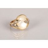 9 carat yellow gold and mother of pearl set ring; 9.1g