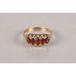 9 carat yellow gold and ruby dress ring; 2.8g