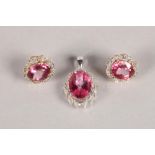 14 carat yellow gold mounted pair of ruby and diamond earrings; together with similar white metal