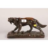 Composition copper mounted model of a standing dog