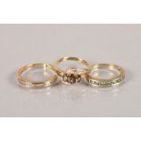 Three 9 carat gold gem set rings; 7.3g