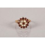 9 carat yellow gold ruby and seed pearl cluster ring; 3.2g