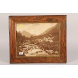 20th century; a pair of sepia photographs of mountain river scenes; in oak frames
