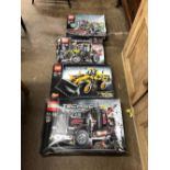 Four boxed Lego Technic kits; 8284; 8274; 8265 & 8285