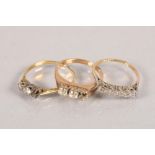 18 carat yellow gold and platinum set ring; together with two 9 carat yellow gold gem set rings; 6g