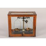 Cased pair of Thomson, Skinner & Hamilton balance scales