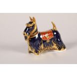 Royal Crown Derby Imari porcelain paperweight; Scottish Terrier; with gold button