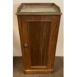 Edwardian mahogany single door pot cupboard on plinth base