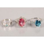 Three 9 carat white gold gem set dress rings; 12.6g