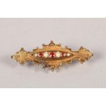 9 carat yellow gold seed pearl and ruby bar brooch; 2.9g