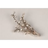 Diamond floral brooch, unmarked metal set with graduated old cut diamonds, ranging from 0.33
